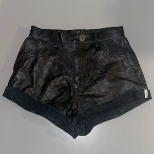 BLACK LEATHER HIGH WAIST SHORTS
ONE TEASPOON COATED BLACK LEATHER BANDIT SHORTS